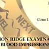 A close-up of a spinning exam wheel labeled for blood impression tests.